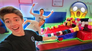 BUILDING A FOAM PIT CASTLE! *trampoline park*