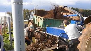 Bio Chopper PTO tractor driven shredder chopping strawberry plants and coir substrate to compost