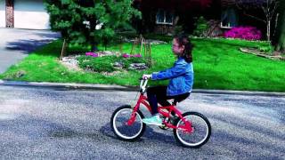 Rayna Riding Her Bike