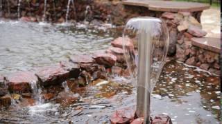 The fountain in the pond the summer