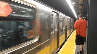 42 Street Shuttle train arriving into Times Sq-42 St on track 4