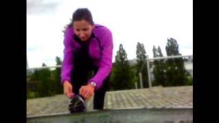 Female  Jogger being funny in the Docks thames London england great britain  UK