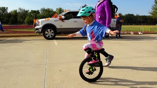 Teaching a 4 year old to ride a unicycle