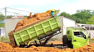 Mobil Dump Truk Pasir Hino 300 Jomplang Muatan Tanah Timbunan