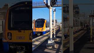 Class 710 pulls into Bethnal Green