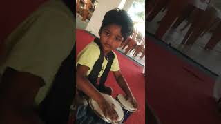 Alex, the music lover is Playing Bongo in the Church.#Alexanderwesley#prodigykid#playingmusic