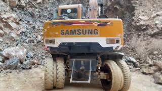 "Heavy-Duty Duos: Samsung Excavator & Cat 966F Wheel Loader" Working On Mining sites