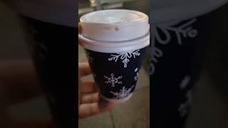 Hot coffee ( Christmas theme paper cup) at Paris baguette.