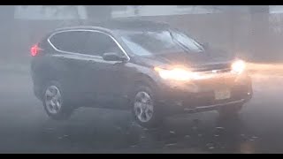 Cars Driving in Thunderstorms