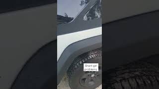 short girl, tight skirt, & a jeep