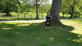 Scottish piper in the Cawdor castle and Gardens