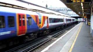 SouthWest Trains' EMUs pass at Wimbledon