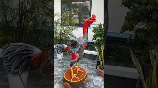 Karya seni patung ayam yang indah