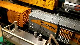 postwar Lionel Milk and Operating boxcars