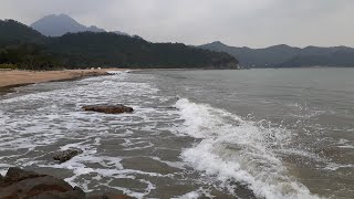 big wave at tai long wan beach lantau