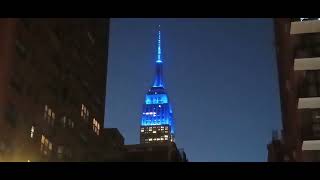 New York City up-close - Empire State Building lit up at night, October 7, 2024