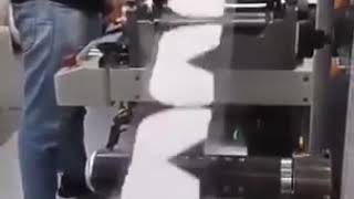 Automatic face mask filming machine