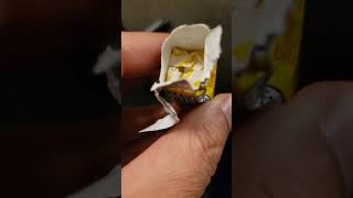 Halls lemon honey cough drops after opening the packaging.