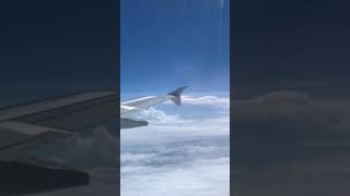 Rain clouds from an airplane: American A320