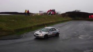 Steven Harvey in a Subaru Impreza followed by Barry Grant in a Peugeot 106 GTi