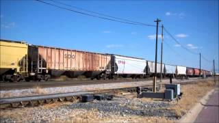 HD: CITX 3079 leads CP 277 by B-17 tower at Bensenville Il.