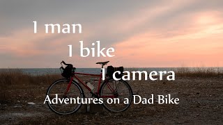 1 bike 1 man 1 camera