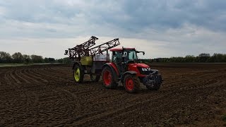 Pflanzenschutz mit KUBOTA M9540 und RAU Feldspritze