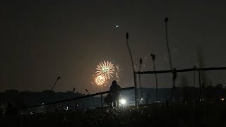 This kid was trying to jump the fence at the fireworks celebration in my town.