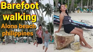 Barefoot in Alona beach bonding holiday. Weather situation in August. Unlimited pose & pictures