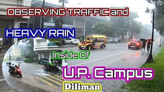 OBSERVING TRAFFIC AND HEAVY RAIN INSIDE OF U.P. CAMPUS DILIMAN