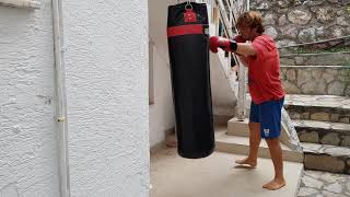 Boxing heavy bag drills for power shot hook setup with fairtex