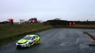 Arron Newby in a Subaru Impreza followed by Tony Bardy in a Ford Focus WRC