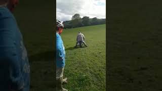 A grandpa on a small dirt bike