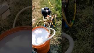 fartilizer sprayer in crop field.