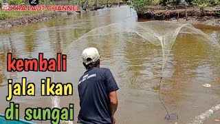 kembali menjala ikan di sungai