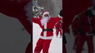 Hundreds of Santas on the ski slopes