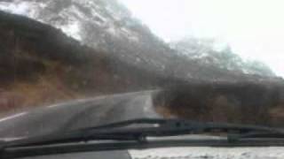 Volvo 245 going over mountain