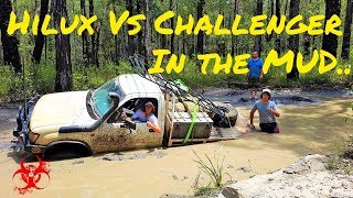 Hilux Vs Challenger in the mud