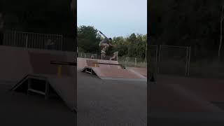 Fat kick flip over a rail | skateboarding