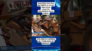 MULTIDÃO FAZ FILA EM FRENTE A LOJAS PARA PEGA OBJETOS DESTRUÍDOS PELAS CHEIAS