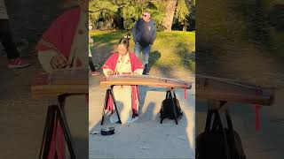 Chinese New Year 2023 - Girl playing a Guzheng