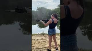 A Girl and her gun.