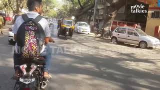 Shahrukh khan in mumbai streets on his BMW with son Abram. Bollywood talkies