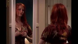 Christina Hendricks busty fiddling with her dress!  VIDEO LOOP!