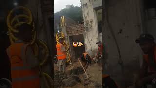 Young boys are cleaning the dirty drains of the city.#shorts#india  #youtubeshorts