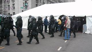 More Storm troopers arrive to beat and gas protesters at Bush 2005 Inauguration