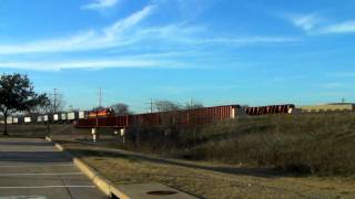 A couple KCS trains coming out of Plano, Tx. 02/15/2012 ©