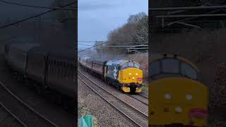 Large logo 37407 'Blackpool Tower' powers its way to Preston with an ECS movement