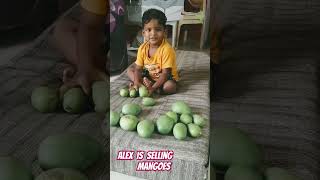 ALEX is playing with his mom.#pretendplay#mangoes#activitiesforkids