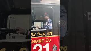 Charleston White driving a fire truck around Chicago